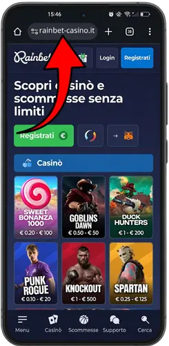 Pagina principale di Rainbet su browser mobile con freccia verso la barra degli indirizzi